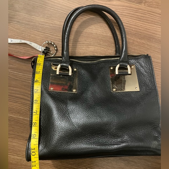 Danier Sage" metal black leather satchel with gold trimmings - Picture 13 of 16